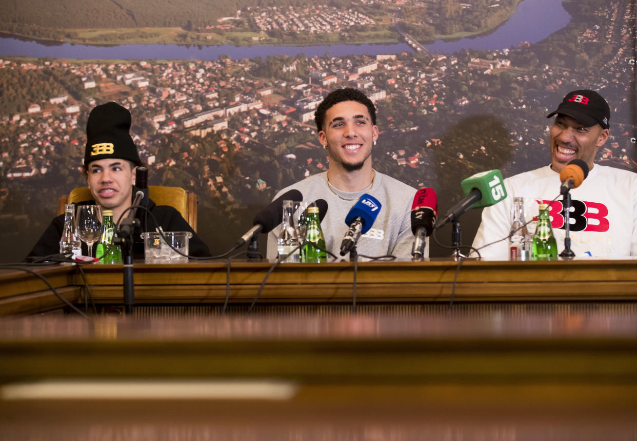 LaVar Ball (R) has pulled sons LaMelo (L) and LiAngelo out of the Lithuanian Basketball League that heralded their arrival. (AP)