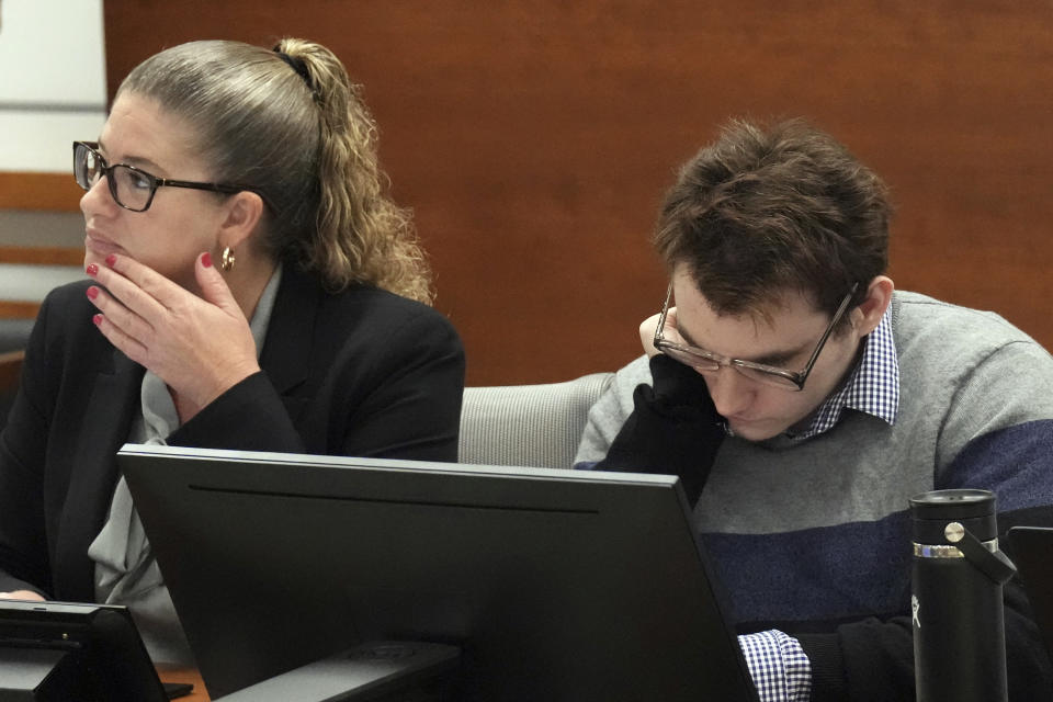 Marjory Stoneman Douglas High School shooter Nikolas Cruz, right, sits with Assistant Public Defender Nawal Bashimam at the defense table during the penalty phase of his trial at the Broward County Courthouse in Fort Lauderdale, Fla., Monday, Sept. 12, 2022. Cruz pleaded guilty to murdering 17 students and staff members in 2018 at Parkland's high school. The trial is only to determine if the 23-year-old is sentenced to death or life without parole. (Amy Beth Bennett/South Florida Sun-Sentinel via AP, Pool)