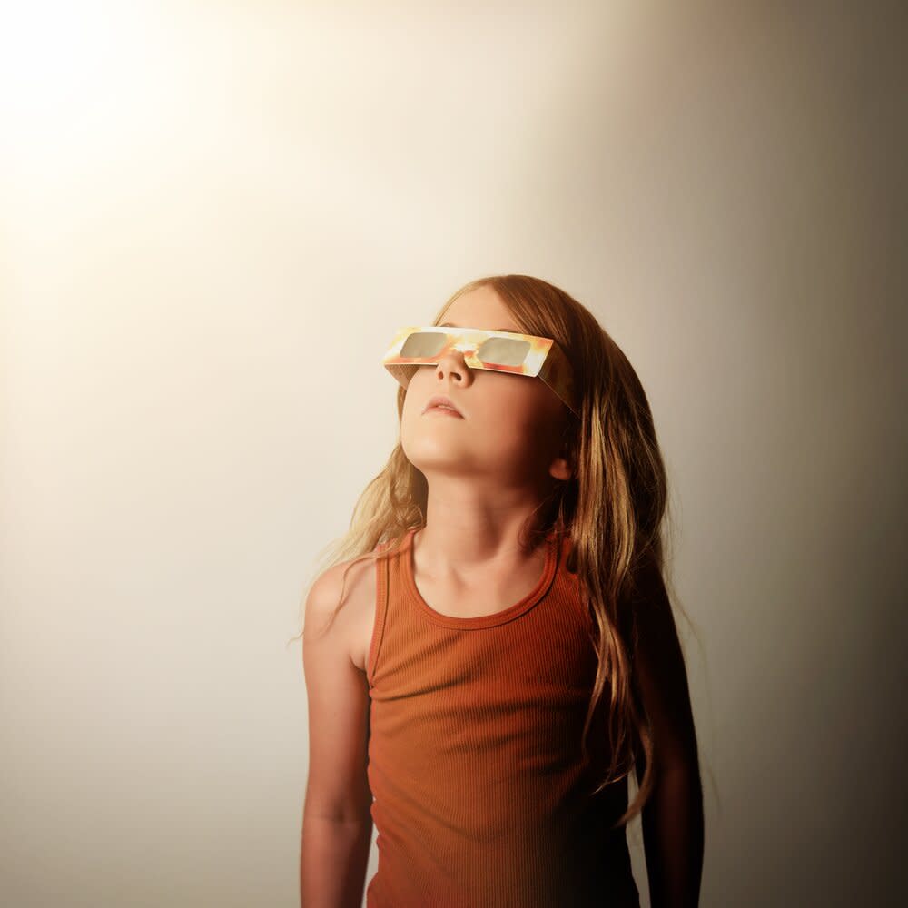 Little Girl Wearing Solar Eclipse Glasses