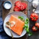 <p>This recipe is so beautiful and yet so simple to prepare--it's perfect for entertaining. You just spread a side of salmon with minced garlic, sprinkle with fresh basil, then layer sliced tomatoes on top. Put it on the grill for 10 minutes and you're done! <a href="https://www.eatingwell.com/recipe/250116/grilled-salmon-with-tomatoes-basil/" rel="nofollow noopener" target="_blank" data-ylk="slk:View Recipe;elm:context_link;itc:0;sec:content-canvas" class="link ">View Recipe</a></p>