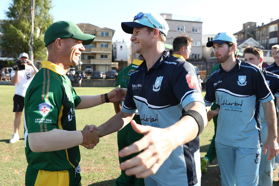 SYDNEY, AUSTRALIA - NOVEMBER 10:  David Warner of Randwick-Petersham and Steve Smith of Sutherland embrace at the end of the Sydney Grade Cricket One Day match between Randwick-Petersham and Sutherland at Coogee Oval on November 10, 2018 in Sydney, Australia.  (Photo by Mark Metcalfe/Getty Images)