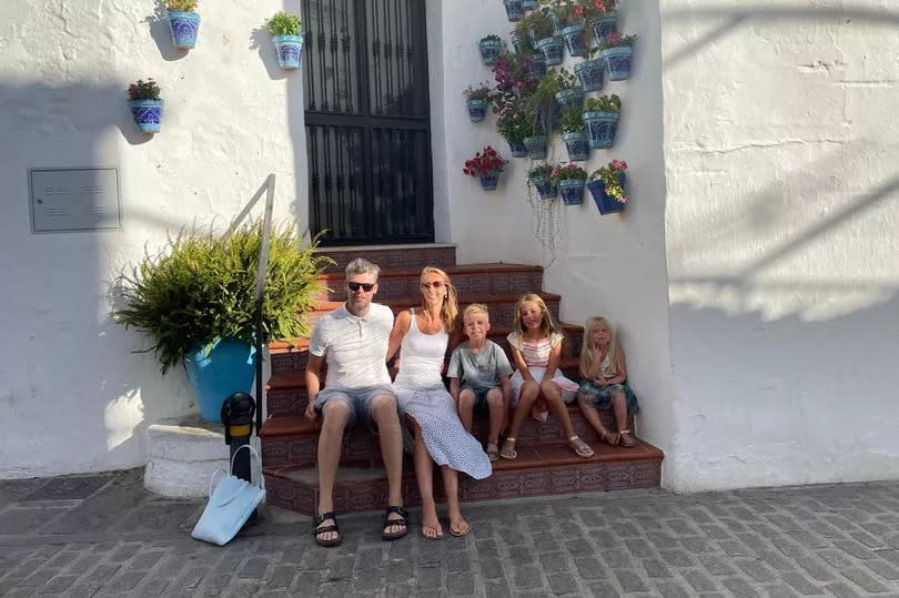 Laura and her family on holiday before she became ill