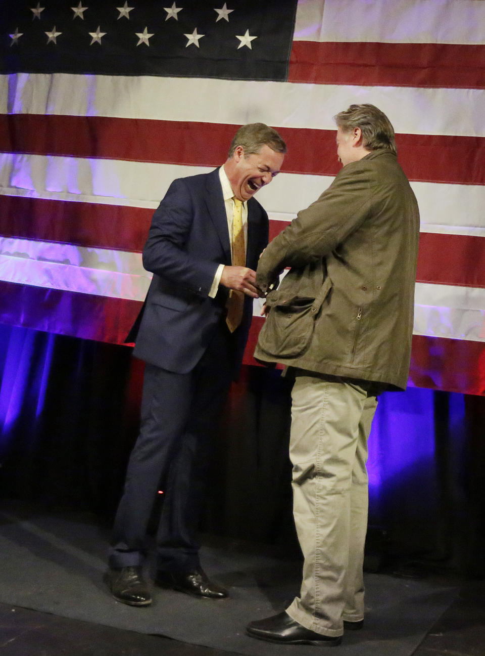 British politician Nigel Farage, left, and former White House strategist Steve Bannon, right, shown during a rally for U.S. Senate hopeful Roy Moore, Monday, Sept. 25, 2017, in Fairhope, Ala. (AP Photo/Brynn Anderson)