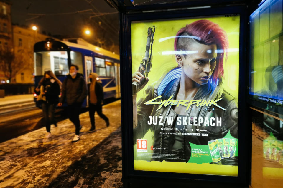 City light poster advertising video game Cyberpunk 2077 is now on stores December 10, 2020 in Krakow, Poland. A worldwide premiere of the game developed and published by CD Projekt Red took place on December 10, 2020. (Photo by Beata Zawrzel/NurPhoto via Getty Images)