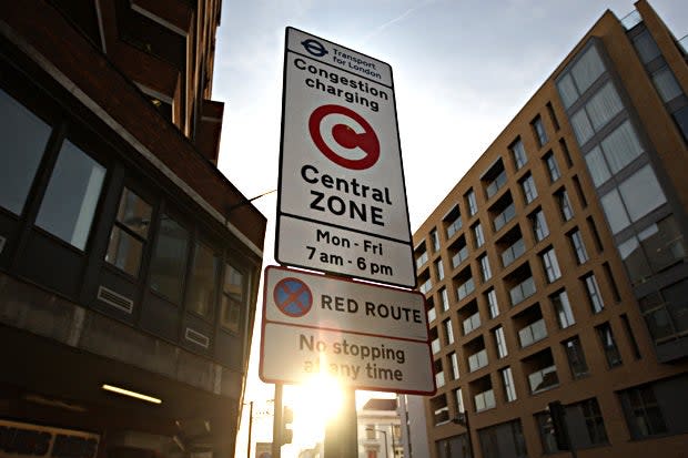 LONDON, ENGLAND - MARCH 16: A sign informing motorists that they are entering the Congestion Charge zone , which incurs an 8GBP fee, stands on March 16, 2009 in London. London Mayor Boris Johnson is considering introducing a variable rate for motorists paying the Congestion Charge dependent on the time of day they enter the zone. One option in the plans being considered could see the implementation of a higher fee for motorists entering the zone during rush hour. (Photo by Oli Scarff/Getty Images): Oli Scarff/Getty