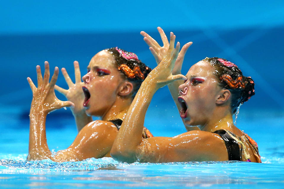 LONDON, ENGLAND - AUGUST 05: Sara Labrousse and Chloe Willhelm of France compete in the Women's Duets Synchronised Swimming Technical Routine on Day 9 of the London 2012 Olympic Games at the Aquatics Centre on August 5, 2012 in London, England. (Photo by Al Bello/Getty Images)