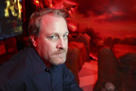 Former MLB player Curt Schilling poses in a game demonstration room at the Electronic Entertainment Expo, or E3, in this photo taken June 9, 2011 in Los Angeles, California. REUTERS/David McNew