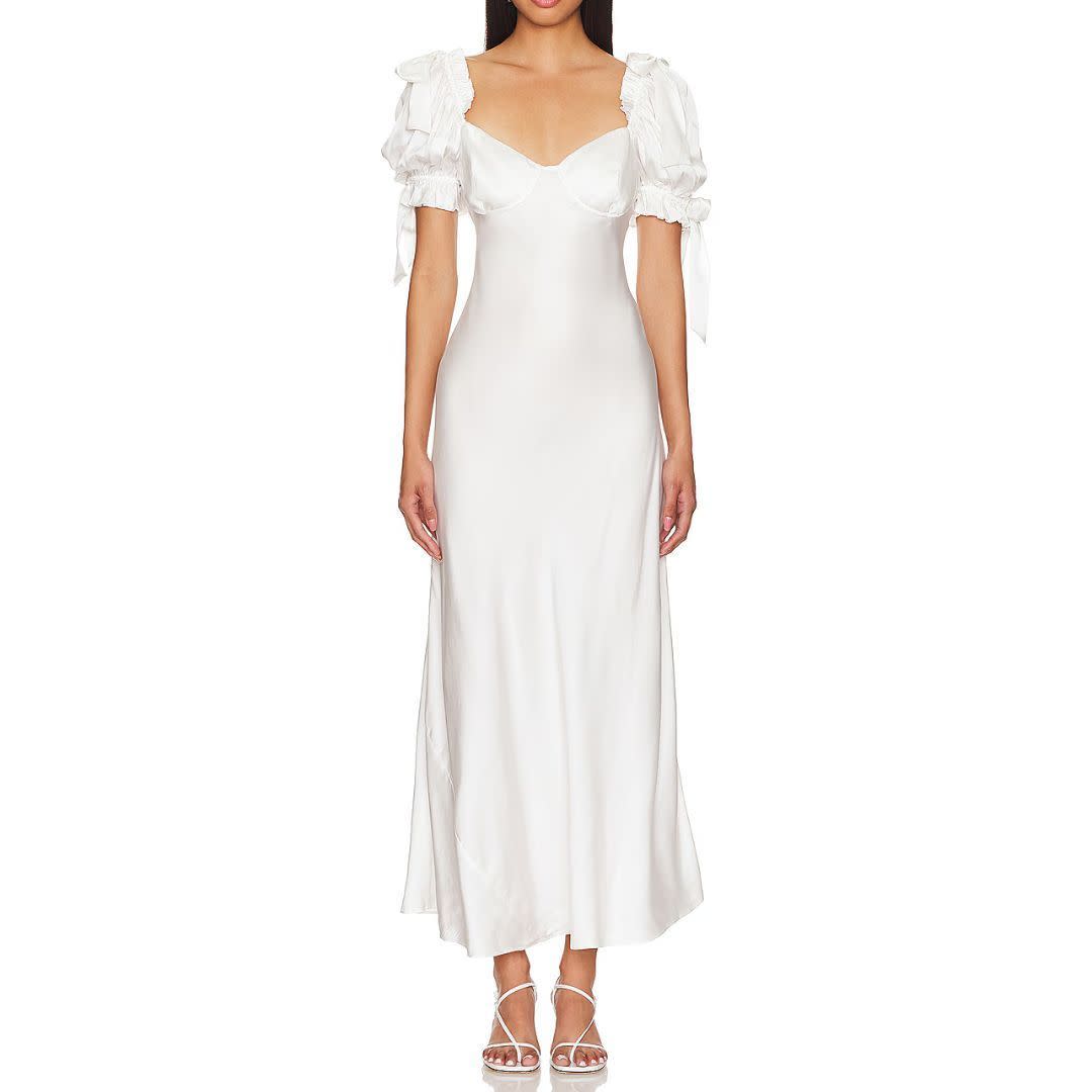 <p><a href="https://go.redirectingat.com?id=74968X1596630&url=https%3A%2F%2Fwww.revolve.com%2Fselkie-the-poet-slip-dress-in-ivory%2Fdp%2FSLKR-WD136%2F&sref=https%3A%2F%2Fwww.cosmopolitan.com%2Fstyle-beauty%2Ffashion%2Fa60358286%2Fkendall-jenner-easter-coquette-dress-dupes%2F" rel="nofollow noopener" target="_blank" data-ylk="slk:Shop Now;elm:context_link;itc:0;sec:content-canvas" class="link rapid-noclick-resp">Shop Now</a></p><p>Selkie Poet Slip Dress</p><p>$374.00</p>