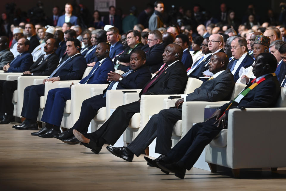 Participants, including Uganda's President Yoweri Museveni, second from right, attend a plenary session of the Russia-Africa Summit and Economic and Humanitarian Forum in St. Petersburg, Russia, Thursday, July 27, 2023. (Alexander Kazakov, Sputnik, Kremlin Pool Photo via AP)