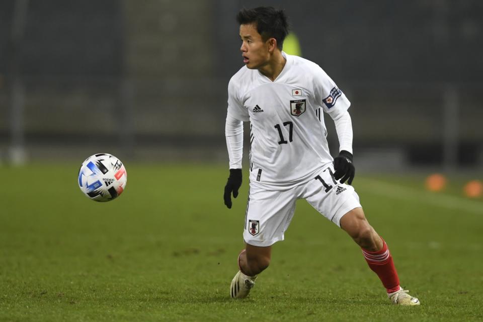 Japan's Takefusa Kubo controls the ball during the international friendly soccer match