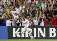 Iran's Ehsan Hajisafi celebrates his goal during their Asian Cup Group C soccer match against Bahrain at the Rectangular stadium in Melbourne January 11, 2015. REUTERS/Brandon Malone (AUSTRALIA - Tags: SOCCER SPORT)