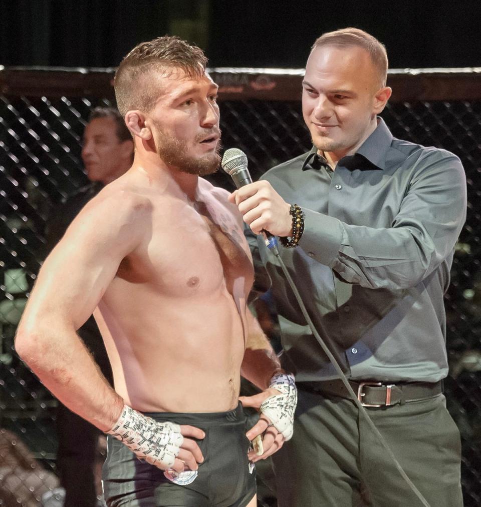 Bloomsburg MMA fighter and instructor Aaron Kennedy being interviewed in the ring right after notching the first victory of his professional career.