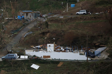 Damaged houses are seen after the area was hit by Hurricane Maria in Yabucoa, Puerto Rico September 22, 2017. REUTERS/Carlos Garcia Rawlins