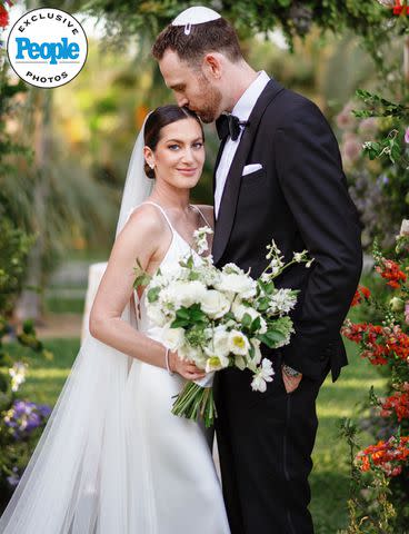 <p>ALEXA COLLINS, DUDETTE PHOTOGRAPHY</p> CNN's Elizabeth Wagmeister marries Michael Sigall on March 17 in Los Cabos.