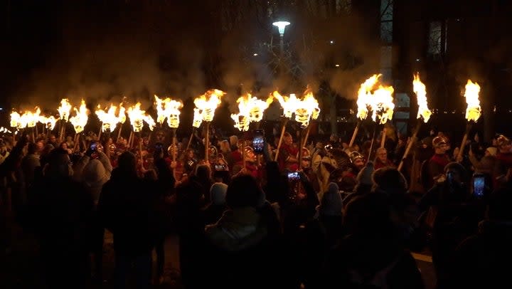 Thousands of torches lit Edinburgh streets on Friday to kick off Hogmanay celebrations. (PA)