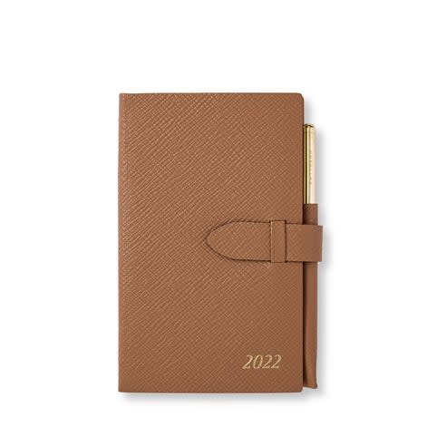 <h2>Smythson Panama Agenda</h2><br>For the classiest planner in the game, look no further than the Smythson. This little baby is filled with Smythson's signature Featherweight paper and bound in cross-grain leather. It also includes a handy gold pencil and a slip pocket for loose papers. <br><br><em>New Year Deal: up to 50% off select <a href="https://go.skimresources.com?id=30283X879131&xs=1&url=https%3A%2F%2Fwww.smythson.com%2Fus%2Fsale" rel="nofollow noopener" target="_blank" data-ylk="slk:items" class="link ">items</a>.</em><br><br><em>Shop <strong><a href="https://go.skimresources.com?id=30283X879131&xs=1&url=https%3A%2F%2Fwww.smythson.com%2Fus%2Flight-rosewood-2022-panama-agenda-with-gilt-pencil-1200149.html" rel="nofollow noopener" target="_blank" data-ylk="slk:Smythson" class="link ">Smythson</a></strong></em><br><br><strong>Smythson</strong> 2022 Panama Agenda with Gilt Pencil, $, available at <a href="https://go.skimresources.com/?id=30283X879131&url=https%3A%2F%2Fwww.smythson.com%2Fus%2Flight-rosewood-2022-panama-agenda-with-gilt-pencil-1200149.html" rel="nofollow noopener" target="_blank" data-ylk="slk:Smythson" class="link ">Smythson</a>