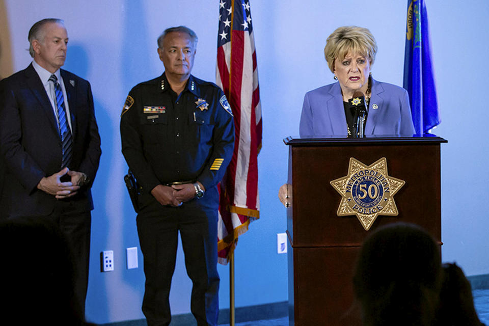 Las Vegas Mayor Carolyn Goodman, right, speaks about a fatal shooting on the University of Nevada, Las Vegas campus during a news conference at Las Vegas Metropolitan Police headquarters, Wednesday, Dec 6, 2023, in Las Vegas. Listening is Nevada Gov. Joe Lombardo, left, and Adam Garcia, vice president of public services and director of UNLV Police. (Christopher DeVargas/Las Vegas Sun via AP)