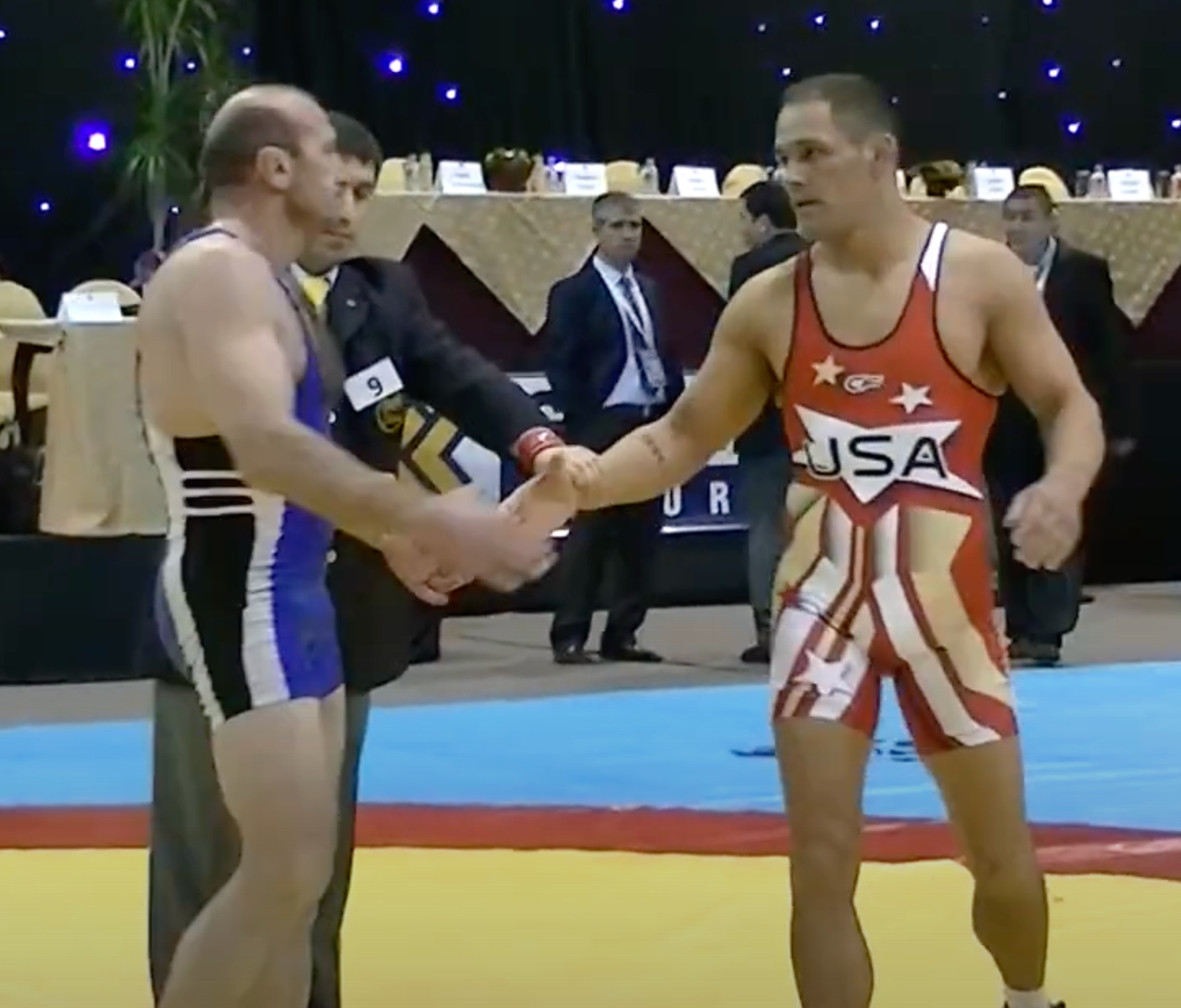 Mike Schyck, right, features in an upcoming documentary on the Ohio State sexual abuse scandal. Pictured at the 2013 Veterans World Freestyle Championships (YouTube / screenshot)