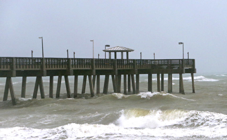 A view of the waves at the Dania Beach, Fla., Pier as Tropical Storm Gordon pass by South Florida with wind gust and heavy rainfall for the Labor Day holiday on Monday, Sept. 3, 2018. (David Santiago/Miami Herald via AP)