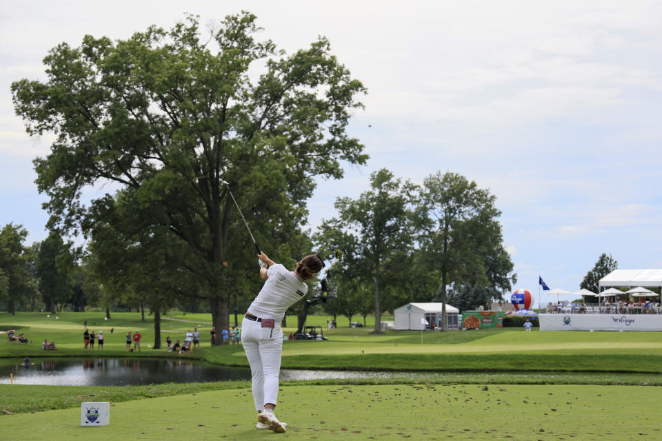 Jeongeun Lee, of South Korea, drives from the 14th tee during the third round of the LPGA Tour Kroger Queen City Championship golf tournament in Cincinnati, Saturday, Sept. 10, 2022. (AP Photo/Aaron Doster)