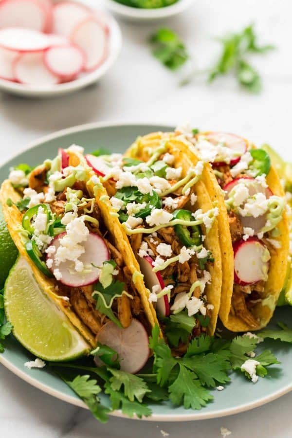 <strong>Get the <a href="https://www.wellplated.com/instant-pot-shredded-chicken-tacos/" target="_blank">Instant Pot Shredded Chicken Tacos</a> recipe from Well Plated</strong>