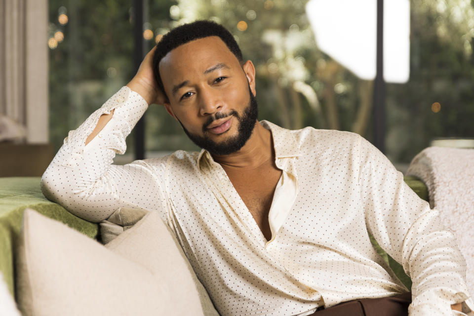 John Legend poses for a portrait on Monday, Aug. 15, 2022, in West Hollywood, Calif., to promote his latest double album "Legend." (Photo by Willy Sanjuan/Invision/AP)