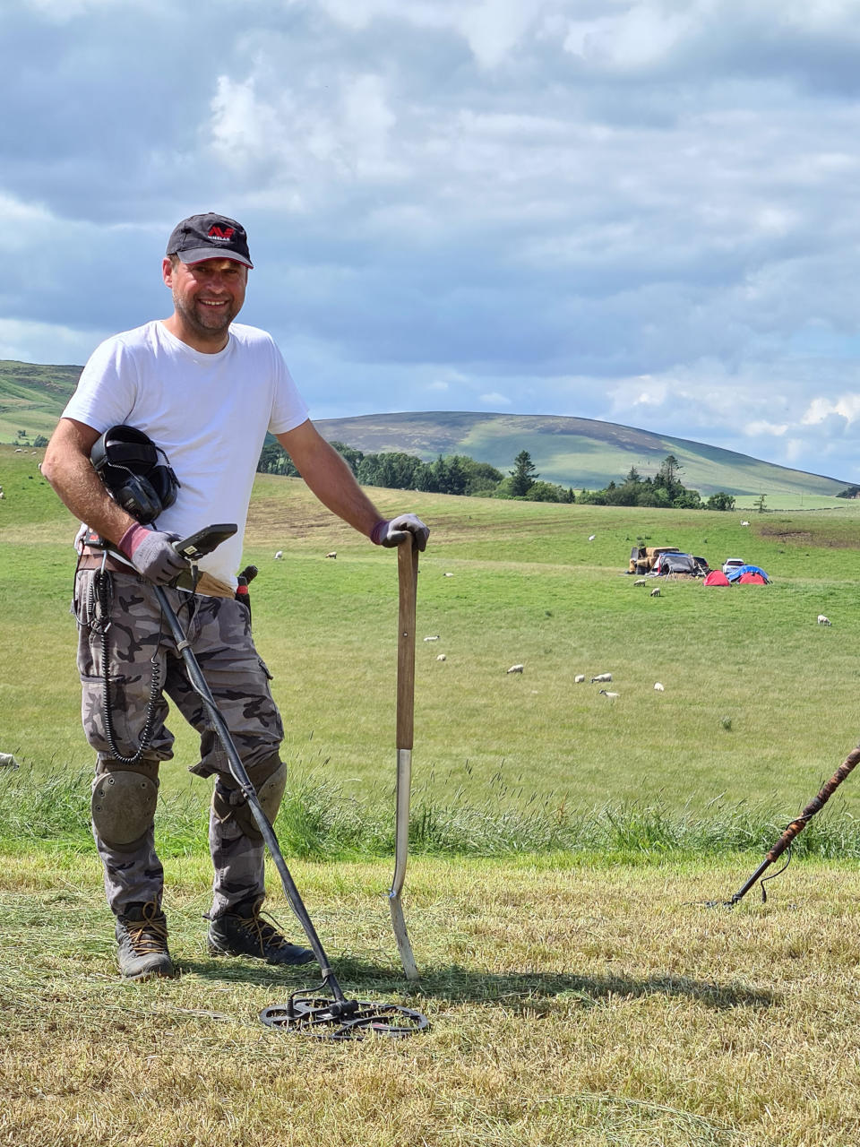 Mariusz Stepien at the excavation near Peebles, after he found objects believed to be decorative and functional pieces of a Bronze Age harness. (Crown Office Communications/PA Wire)