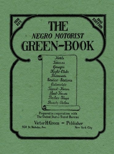 A green and black book cover of a1940 edition of Victor H. Green's The Negro Motorist Green-Book travel guide.