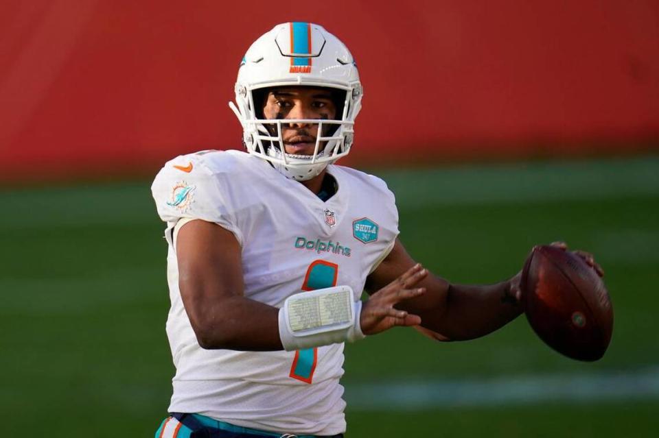 Miami Dolphins quarterback Tua Tagovailoa (1) looks to throw against the Denver Broncos during the first half of an NFL football game, Sunday, Nov. 22, 2020, in Denver. (AP Photo/David Zalubowski)