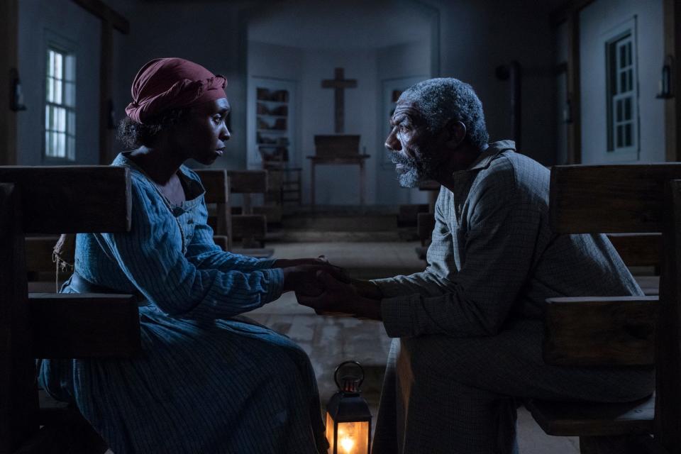 This image released by Focus Features shows Cynthia Erivo as Harriet Tubman, left, and Vondie Curtis-Hall as Reverend Green in a scene from "Harriet." (Glen Wilson/Focus Features)