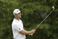 Jon Rahm, of Spain, hits from the 14th tee during the second round of the Memorial golf tournament, Friday, July 17, 2020, in Dublin, Ohio. (AP Photo/Darron Cummings)