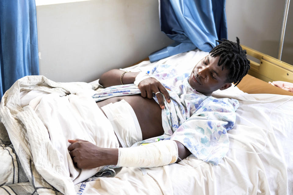 Ugandan LGBTQ+ activist Steven Kabuye receives treatment at a hospital after he was attacked by unknown people, in Kitende on the outskirts of Kampala, Uganda, Thursday, Jan. 4, 2024. Kabuye, a well-known gay rights activist was stabbed by unknown assailants Wednesday, and police said he was hospitalized in critical condition. (AP Photo/Hajarah Nalwadda)