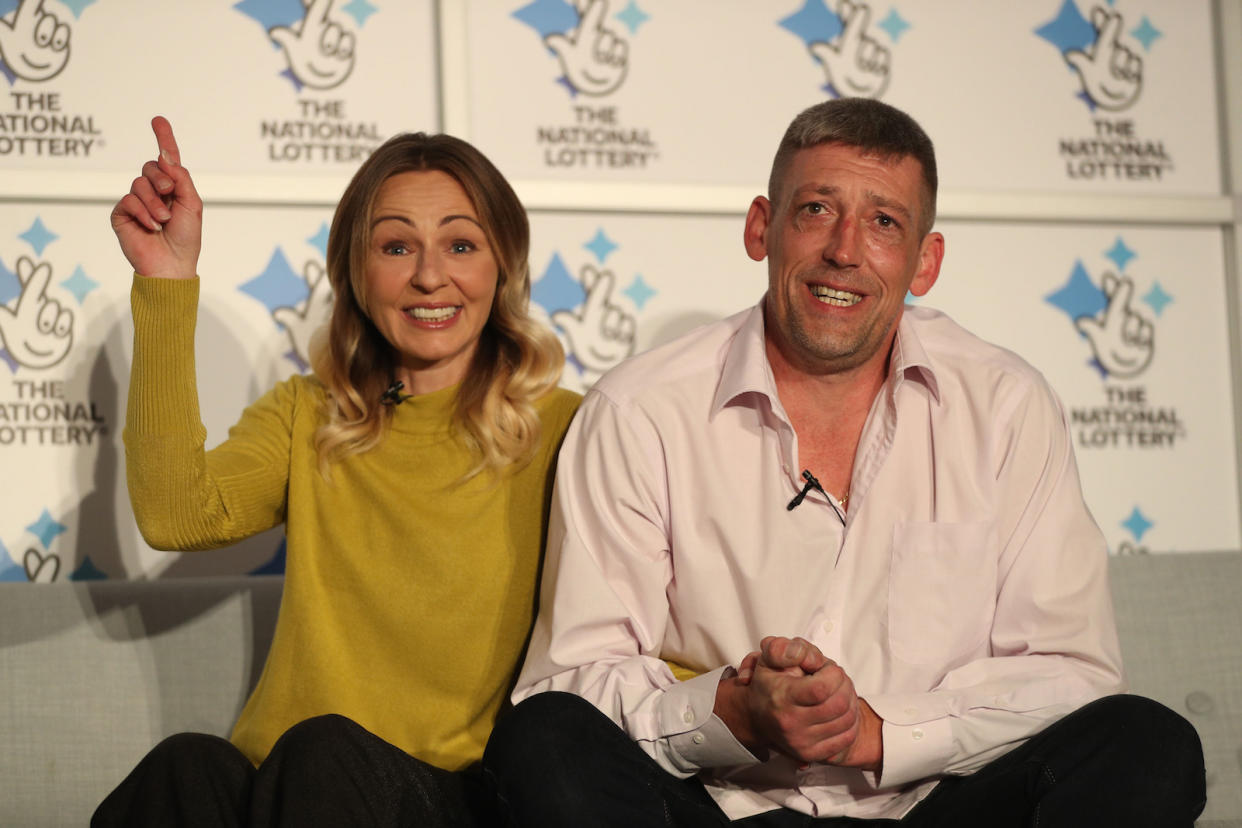 Self-employed builder Steve Thomson, right, and his wife Lenka, from Selsey, West Sussex, have won £105 million (Picture: PA)