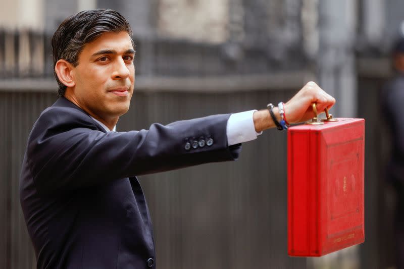 Britain's Chancellor of the Exchequer Sunak presents the budget box in London