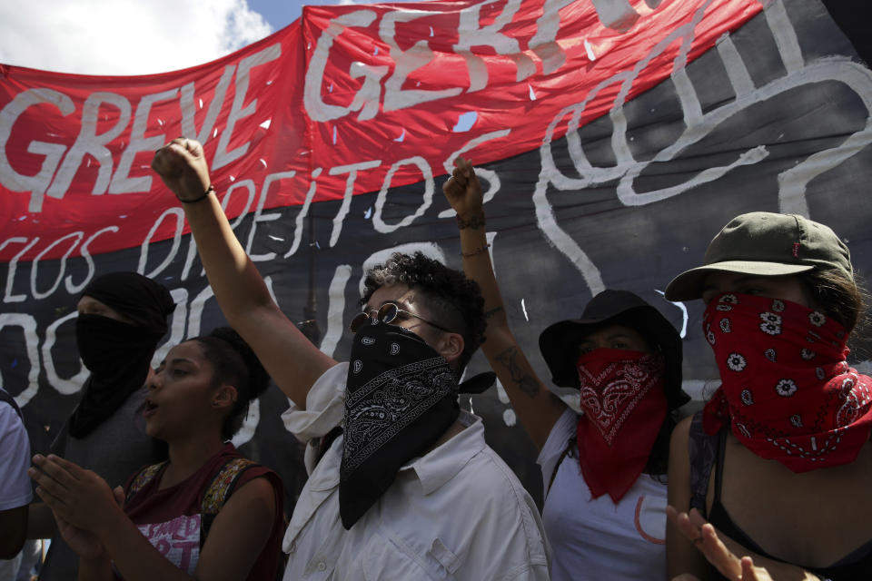 Students take part in a nation-wide education strike, in Brasilia, Brazil, Wednesday, May 15, 2019. Federal education officials this month announced budget cuts of $1.85 billion for public education, part of a wider government effort to slash spending. (AP Photo/Eraldo Peres)