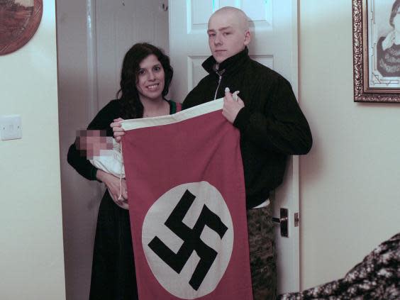 Adam Thomas and Claudia Patatas posed for pictures with their son alongside Nazi paraphernalia (PA)