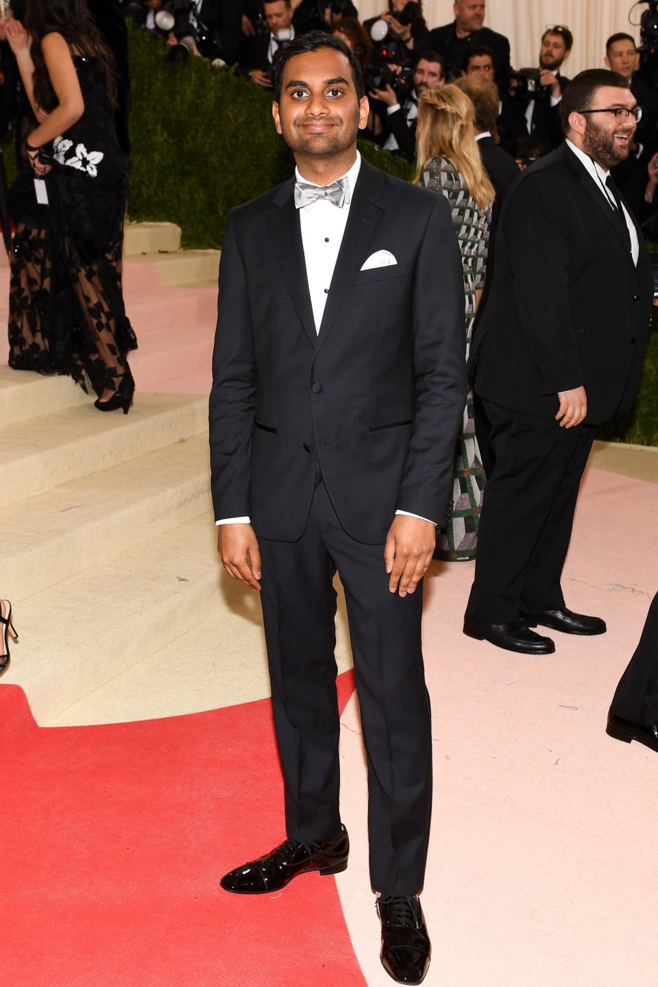 <h1 class="title">Aziz Ansari in Christian Louboutin shoes</h1><cite class="credit">Photo: BFA.com</cite>