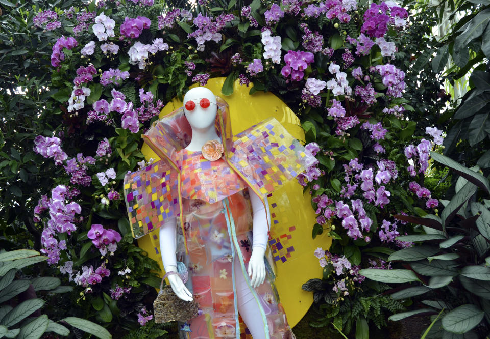 A fashion-creation inspired by nature from FLWR PSTL designed by Kristen Alpaugh in "The Orchid Show: Florals in Fashion" at The New York Botanical Garden, Saturday, Feb. 17, 2024, in the Bronx borough of New York. The exhibition is on through April 21, 2024. (AP Photo/Pamela Hassell)