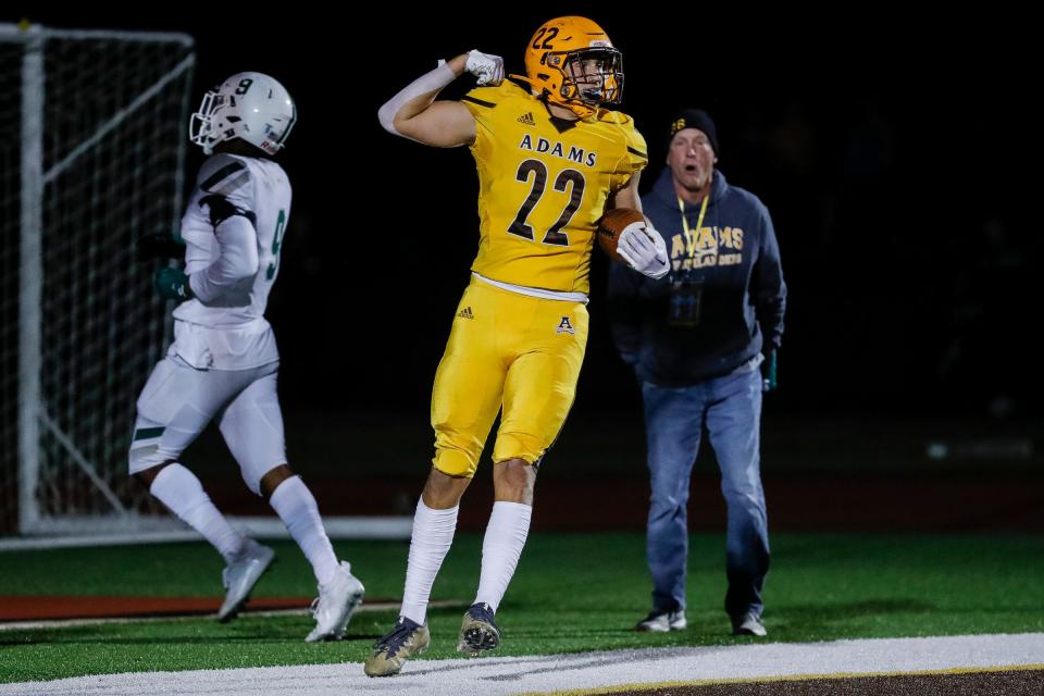 Rochester Adams wide receiver Brady Prieskorn (22) scores a touchdown against West Bloomfield during the first half at Rochester Adams High School in Rochester Hills on Friday, Sept. 23, 2022.