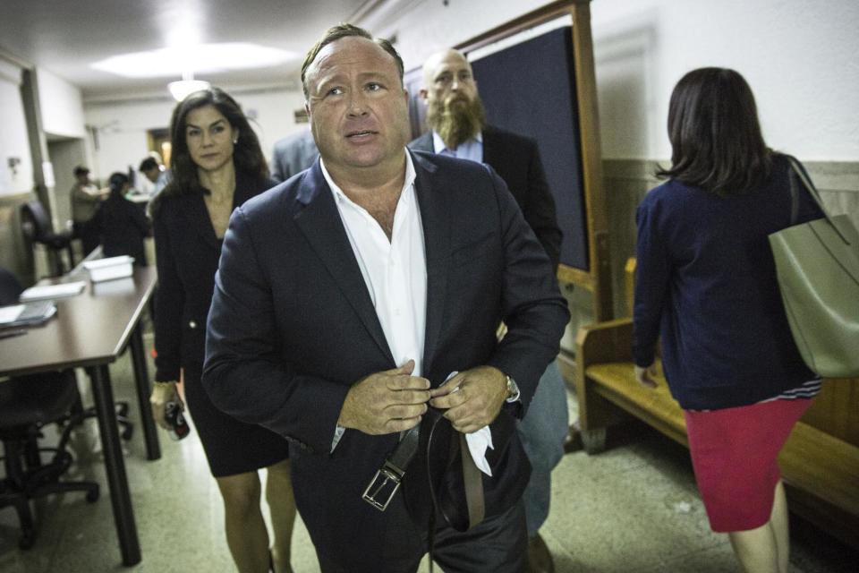 Shock jock: Alex Jones arrives at the Travis County Courthouse in Austin, Texas: AP