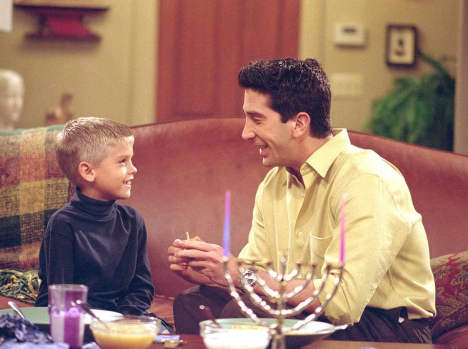 <p>Warner/NBC </p> Cole Sprouse and David Schwimmer on "Friends" in 2000