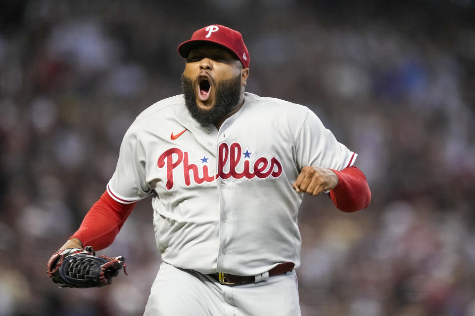 Philadelphia Phillies relief pitcher Jose Alvarado celebrates the last out against the Arizona Diamondbacks during the seventh inning in Game 3 of the baseball NL Championship Series in Phoenix, Thursday, Oct. 19, 2023. (AP Photo/Brynn Anderson)