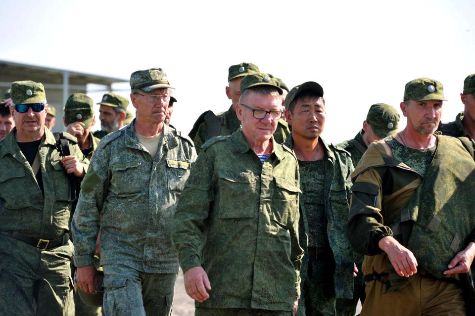 A crowd of men in military training uniforms.