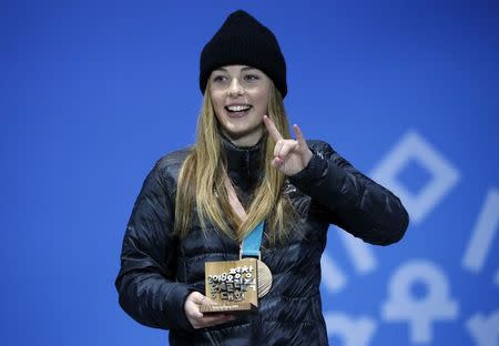 Medals Ceremony - Snowboarding - Pyeongchang 2018 Winter Olympics - Women's Big Air - Medals Plaza - Pyeongchang, South Korea - February 22, 2018 - Bronze medalist Zoi Sadowski-Synnott of New Zealand on the podium. REUTERS/Kim Hong-Ji