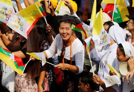 People line the street as they await the arrival of Pope Francis in Yangon, Myanmar November 27, 2017. REUTERS/Jorge Silva