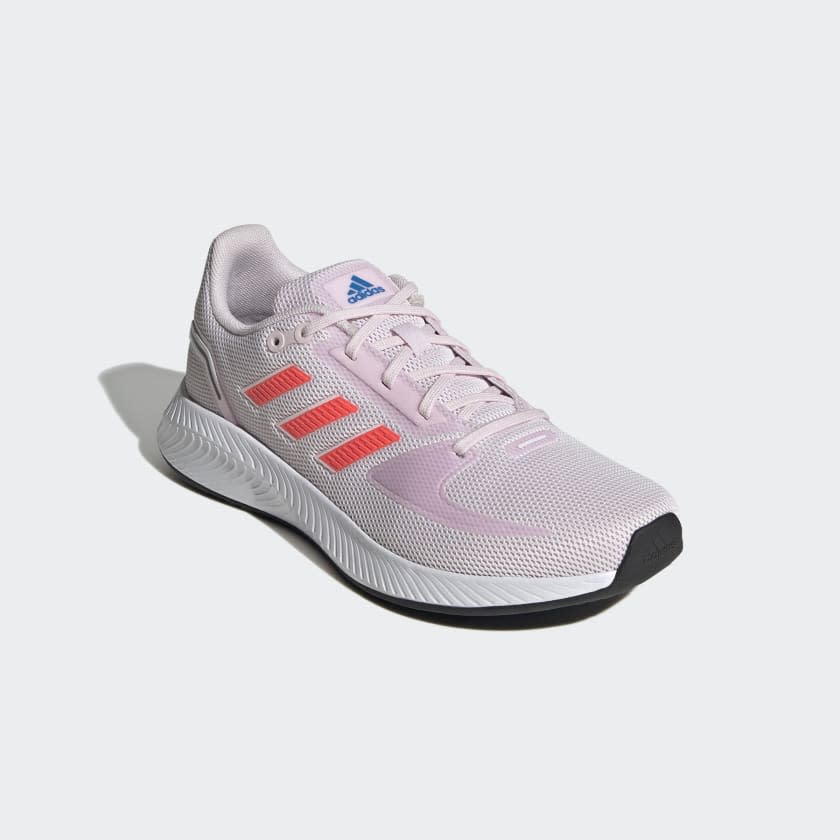 Pink shoes with three orange stripes