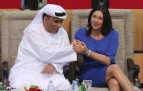 FILE - In this Oct. 27, 2018 file photo, Israeli Culture and Sport Minister Miri Regev, right, shakes hands with Mohamed Bin Tha'loob Al Derai, President of UAE Wrestling Judo & Kickboxing Federation, after an Israeli player won the bronze medal during the Abu Dhabi Grand Slam Judo tournament in Abu Dhabi, United Arab Emirates. In a tweet on Thursday, August 13, 2020, President Donald Trump said the United Arab Emirates and Israel will establish diplomatic ties in deal halting planned annexation of occupied land sought by the Palestinians for their future state. It means the UAE, which is home to the cities of Dubai and Abu Dhabi, would become the first Gulf Arab state to have ties to Israel. (AP Photo/Kamran Jebreili, File)