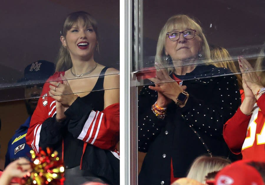 KANSAS CITY, MISSOURI – OCTOBER 12: Taylor Swift and Donna Kelce cheer before the game between the Kansas City Chiefs and the Denver Broncos at GEHA Field at Arrowhead Stadium on October 12, 2023 in Kansas City, Missouri. (Photo by Jamie Squire/Getty Images)