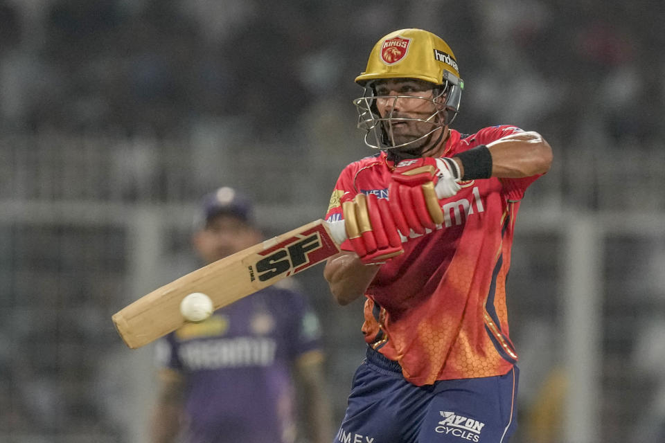 Punjab Kings Shashank Singh plays a shot during the Indian Premier League cricket match between Kolkata Knight Riders and Punjab Kings' in Kolkata, India, Friday, April 26, 2024. (AP Photo/Bikas Das)