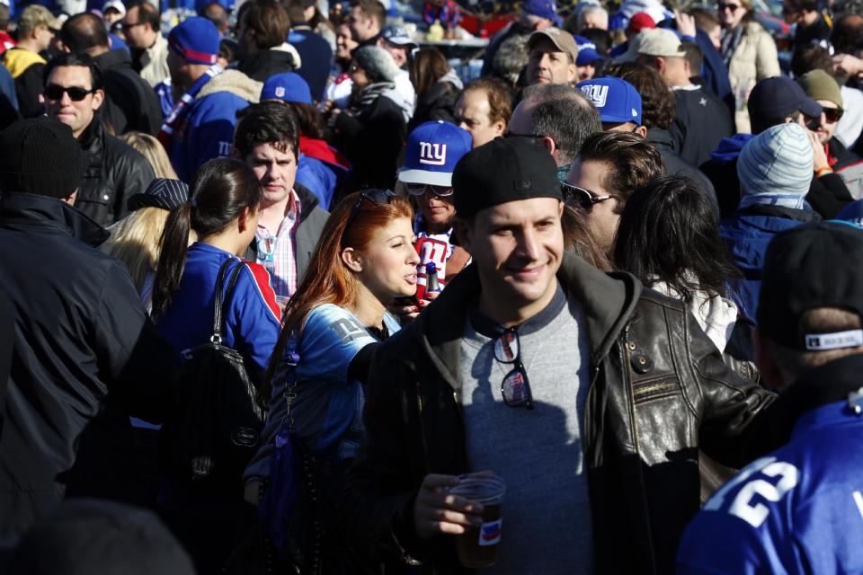 Fans tailgate before an NFL football game between the New York Giants and the Pittsburgh Steelers, Sunday, Nov. 4, 2012, in East Rutherford, N.J. (AP Photo/Julio Cortez)